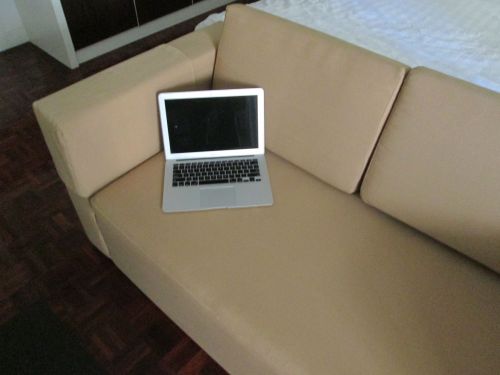 MacBook on Sofa